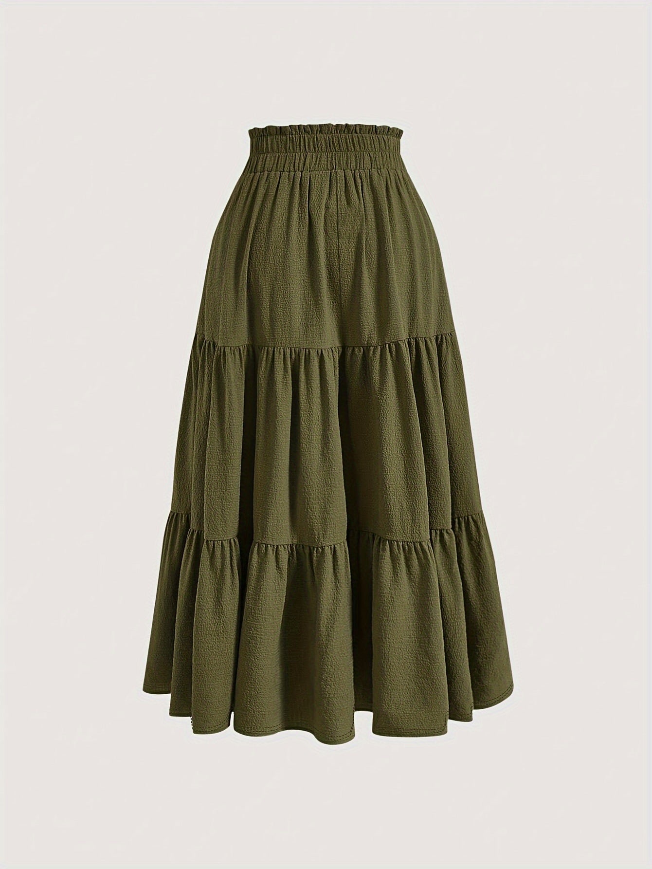 High-waisted maxi skirt with ruffled hem, made of polyester blend, perfect for casual wear in spring, summer, and autumn, machine washable.