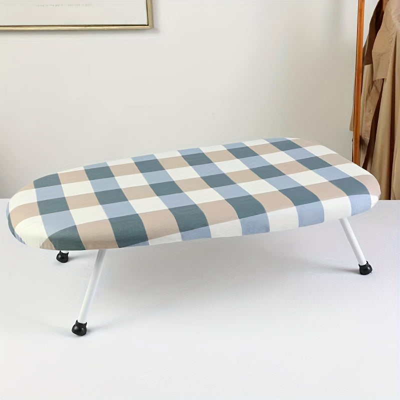 Space-saving foldable ironing board, ideal for home and office use, made of stainless steel and plastic materials.