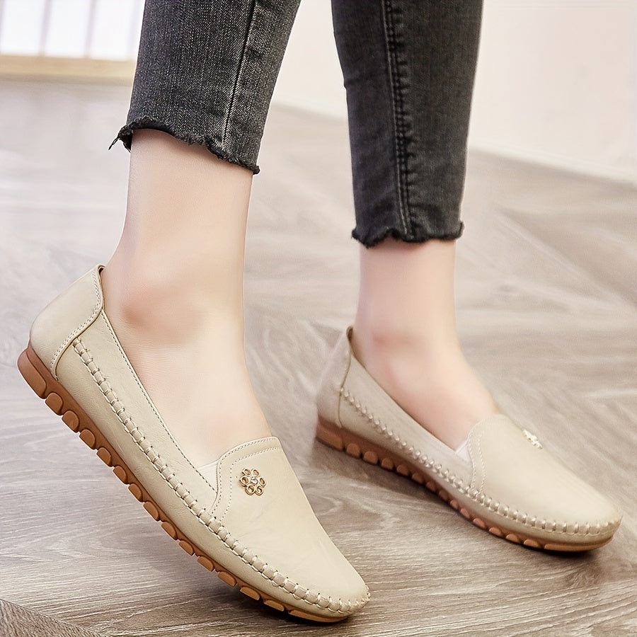 Stylish, comfortable women's loafers with flower buckle detail and soft sole for daily wear.