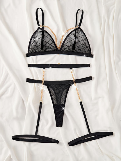 Sheer plaid lingerie set with gold chain detailing. Includes bra, garter belt, and thong.