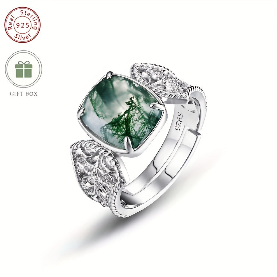 The Vintage-Inspired Green Moss Agate Open Ring is a timeless piece made with 2.4CT of stunning green moss agate set in S925 sterling silver. This elegant ring is perfect for both daily wear and gifting. Featuring a unique water grass design, the stone