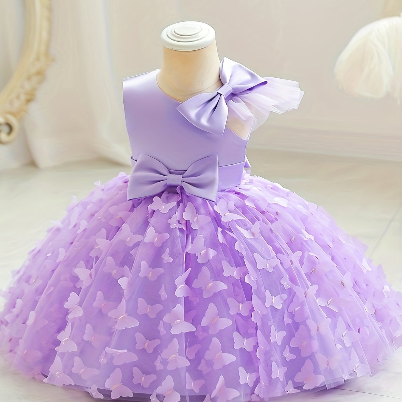 Toddler girls princess dress with butterfly design, bow belt, and flutter mesh sleeves, perfect for parties and birthdays.