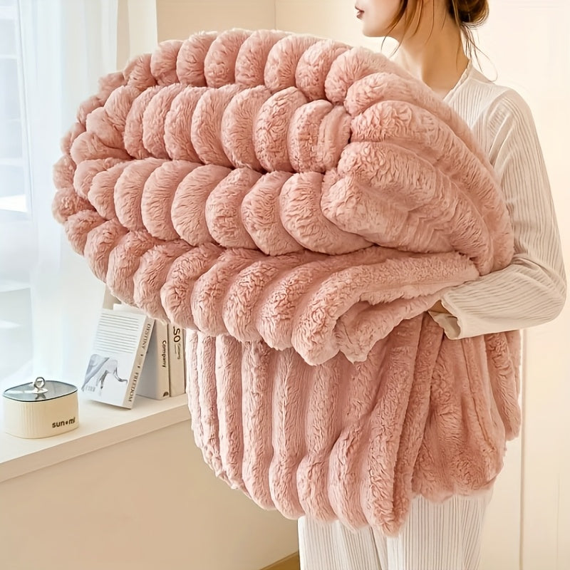 Get cozy with this multifunctional blanket made of ultra-soft milk fleece. Featuring a modern striped texture, this blanket is perfect for all-season comfort on your bed, sofa, or even while camping. Machine washable for easy care, this blanket is an