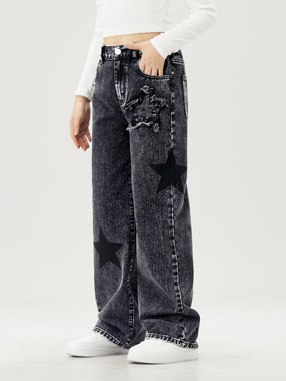 Youngsters' wide-leg denim jeans with star pattern, elastic waistband, comfort fit, machine washable. Perfect for everyday outings and comfortable playwear. Nonstretch denim.