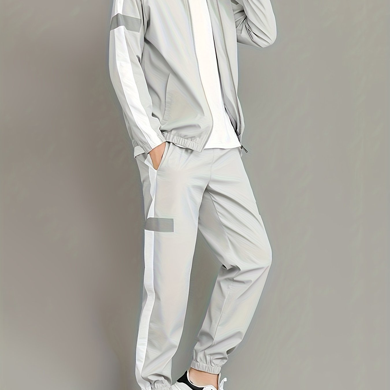 Men's spring and autumn sport suit with colorful collar, includes long sleeve top and pants.