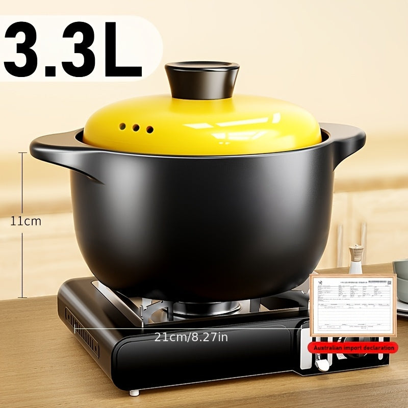 A versatile 5-liter black ceramic stockpot featuring a vibrant yellow lid - perfect for preparing stews, soups, and pot roasts at high temperatures. This multi-functional, heat-resistant, non-stick stockpot is suitable for use on open fires and electric