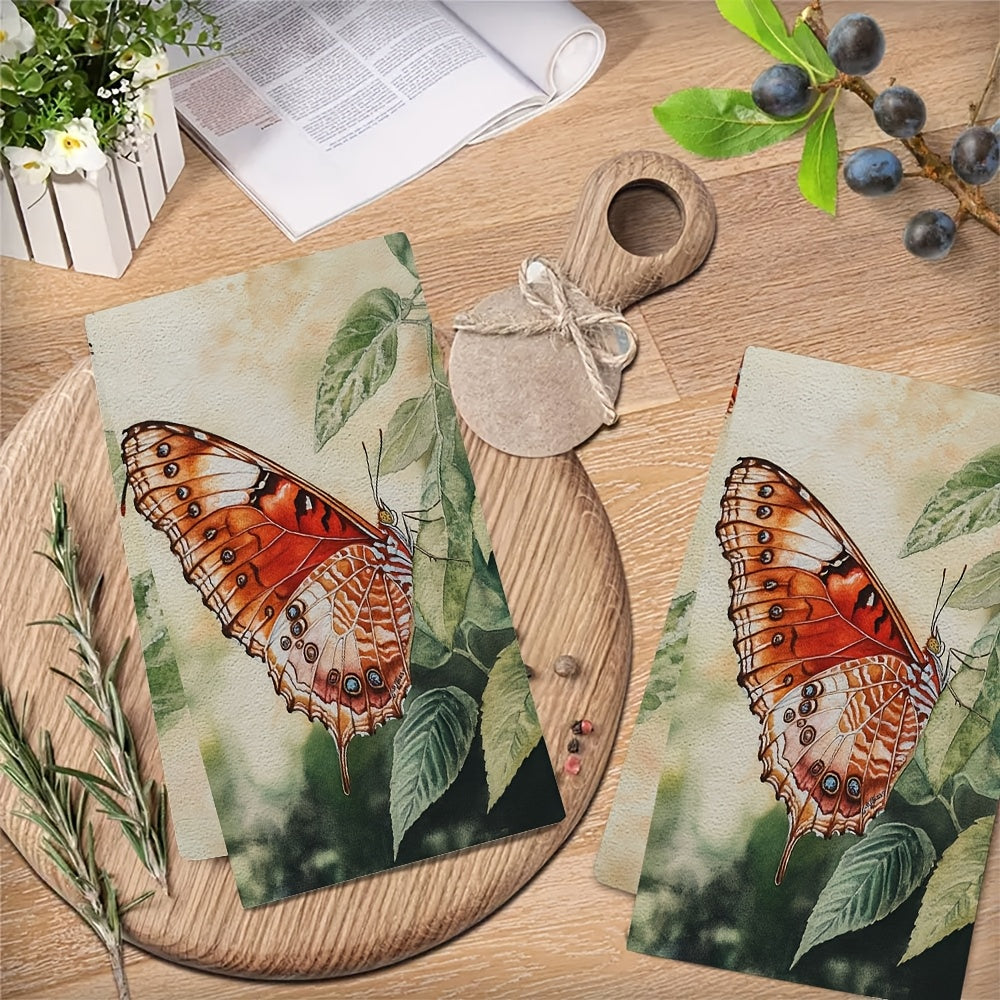 Two pieces of ultra soft kitchen towels featuring a vibrant butterfly design. These highly absorbent and machine washable dish hand towels are perfect for adding a contemporary coastal decor to your kitchen. Each towel measures 40.64x60.96 cm.