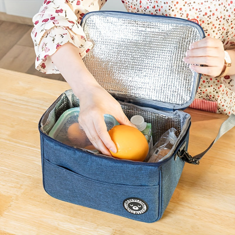 Large-capacity portable lunch bag made of cationic Oxford cloth, ideal for back to school, school supplies, classroom, kitchen organization, and storage. This thermal bento bag is perfect for carrying lunch on the go.