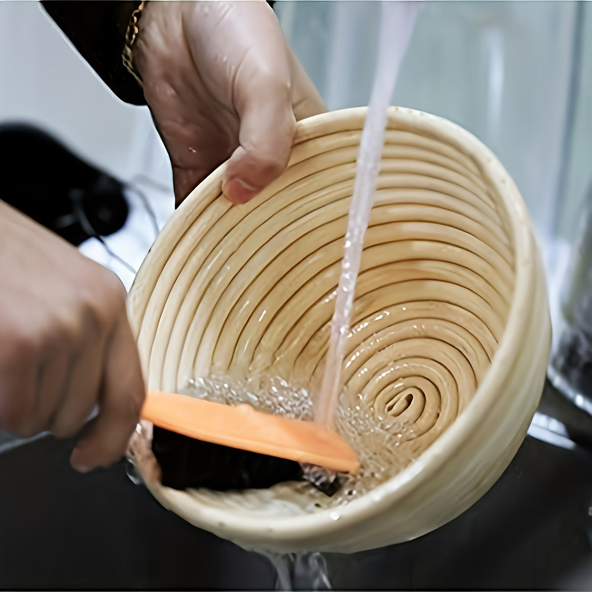 Set of two modern round bread proofing baskets with liners made from rattan. This banneton basket kit is ideal for baking artisan sourdough bread, providing a non-stick fermentation basket for home bakers and bread making.