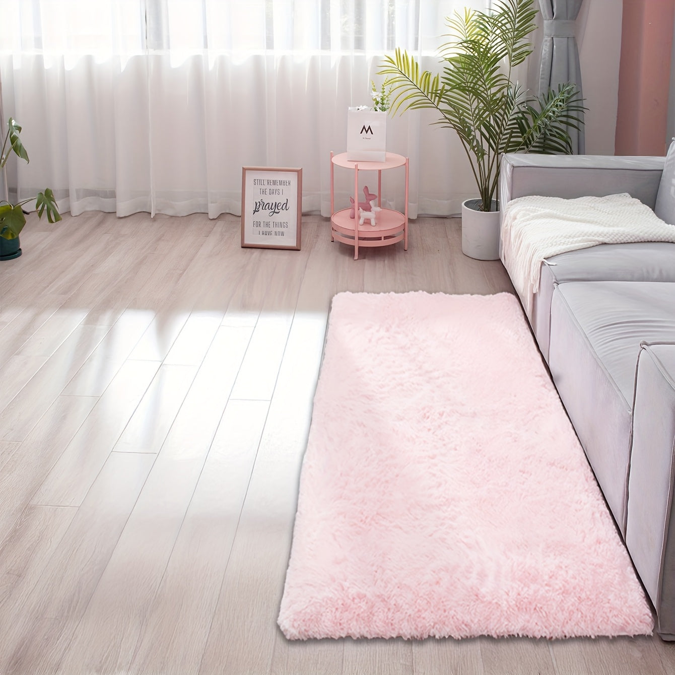 Soft and fluffy rectangle area rug perfect for your bedroom. This plush carpet is thick and non-slip, making it ideal for your living room. Made with machine-made polyester fiber, this low-pile rug is washable for easy cleaning. Perfect for indoor use.