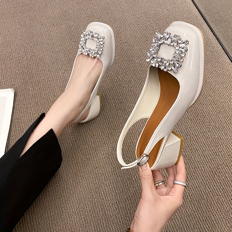 Chunky low heeled sandals with rhinestone buckle and square toe. Casual slingback strap for stylish look.