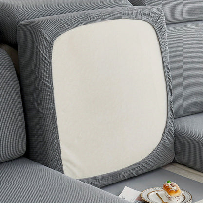 Durable sofa cover protects furniture from spills and stains.