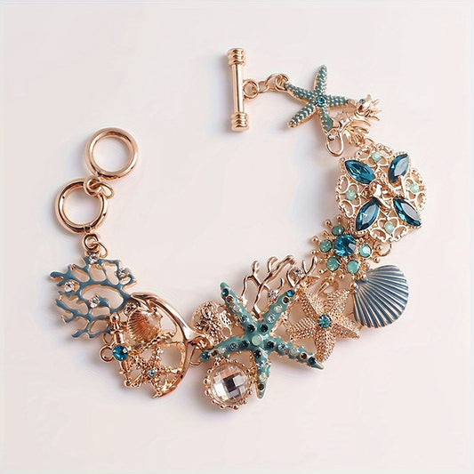 Bohemian style bracelet with starfish, coral, and seashell accents - Vintage ocean-inspired chain bracelet for beach jewelry, perfect for ladies.