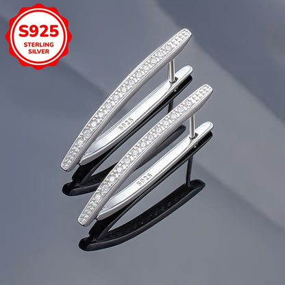 These stunning women's fashion earrings boast a high-end, sophisticated design with V-shaped inlaid synthetic zirconia, weighing 5.5 grams in a silvery hue. Perfect for everyday wear, vacations, parties, banquets, or as a luxurious gift.