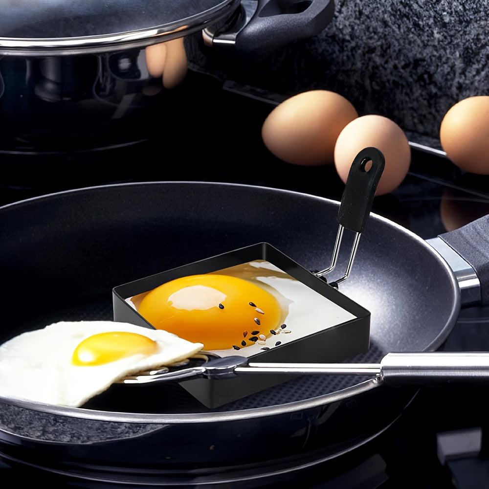 Two pieces of 10.16cm square egg and pancake rings made of non-stick stainless steel, ideal for cooking omelets, muffins, and breakfast sandwiches.