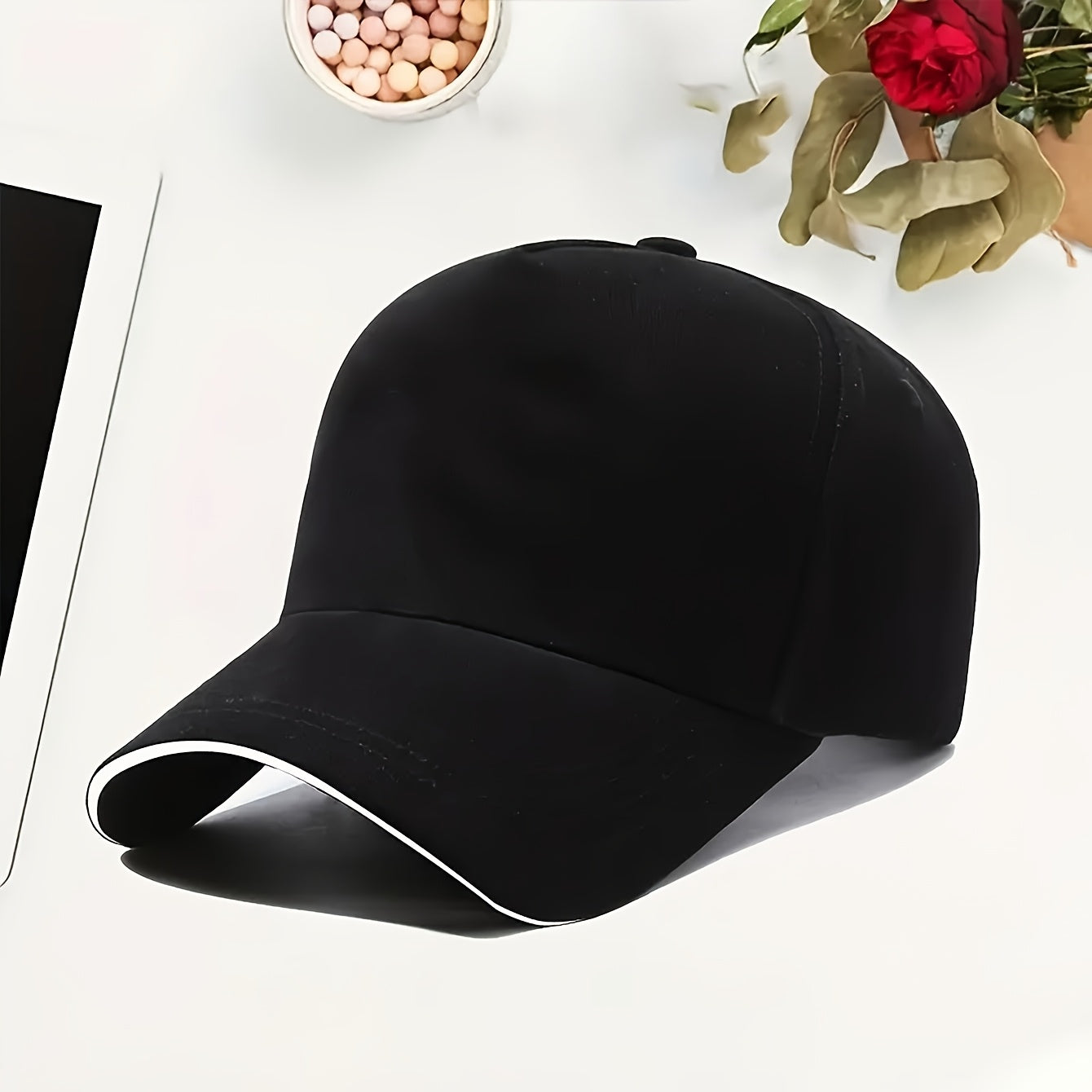 Lightweight polyester sun hat with adjustable drawstring closure for urban summer style.