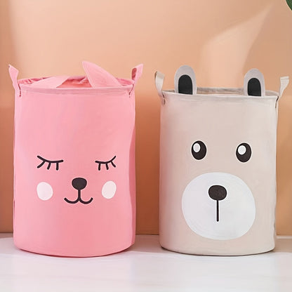 A fun and functional hamper featuring a cartoon pattern, made of linen fabric with cute ears design. Perfect for organizing and storing clothes, toys, and other items. Ideal for use in the bathroom, bedroom, living room, or laundry room.