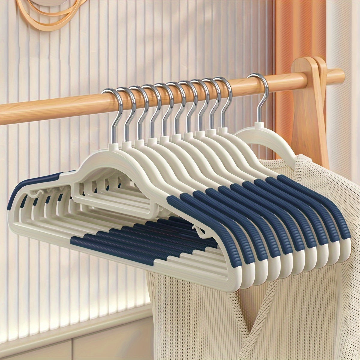 20 non-slip, sturdy clothes hangers for organizing and drying clothes in any room.