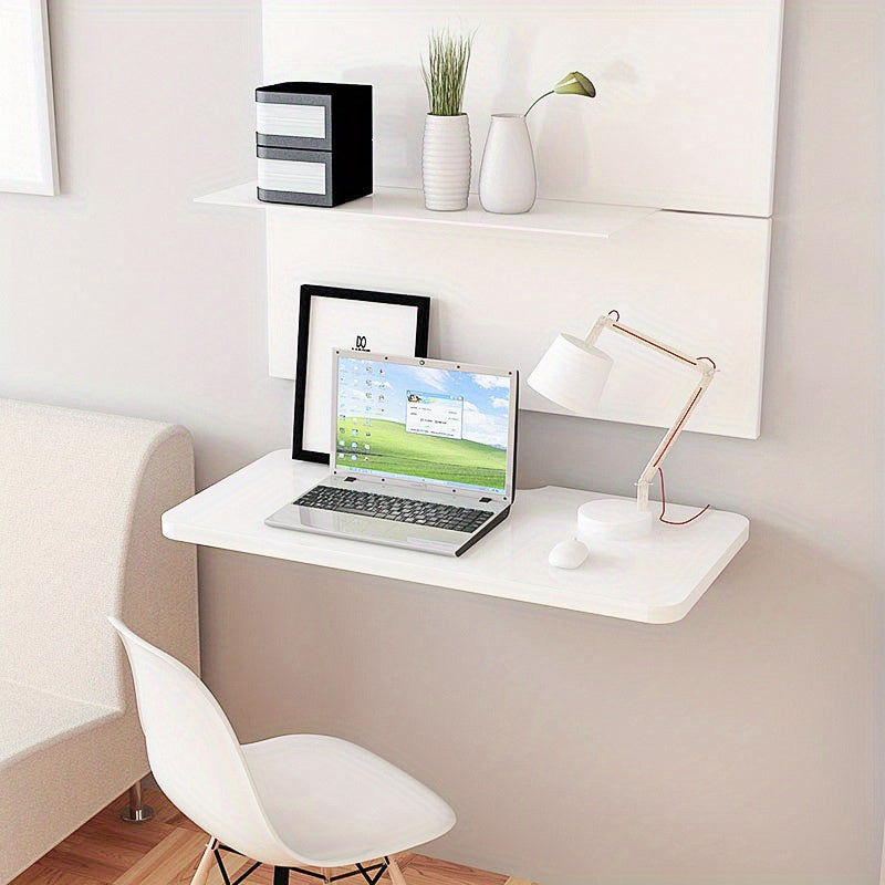 White wooden wall-mounted folding desk with adjustable computer monitor and laptop stand made of cork material, perfect for home and office organization in kitchens and dorms.