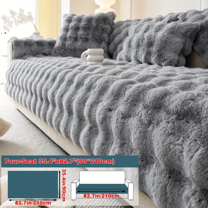 Faux rabbit fur sofa cover for cozy winter warmth. Pet-friendly, machine washable. Fits single to four-seater sofas. Perfect for living room, bedroom, office decor.