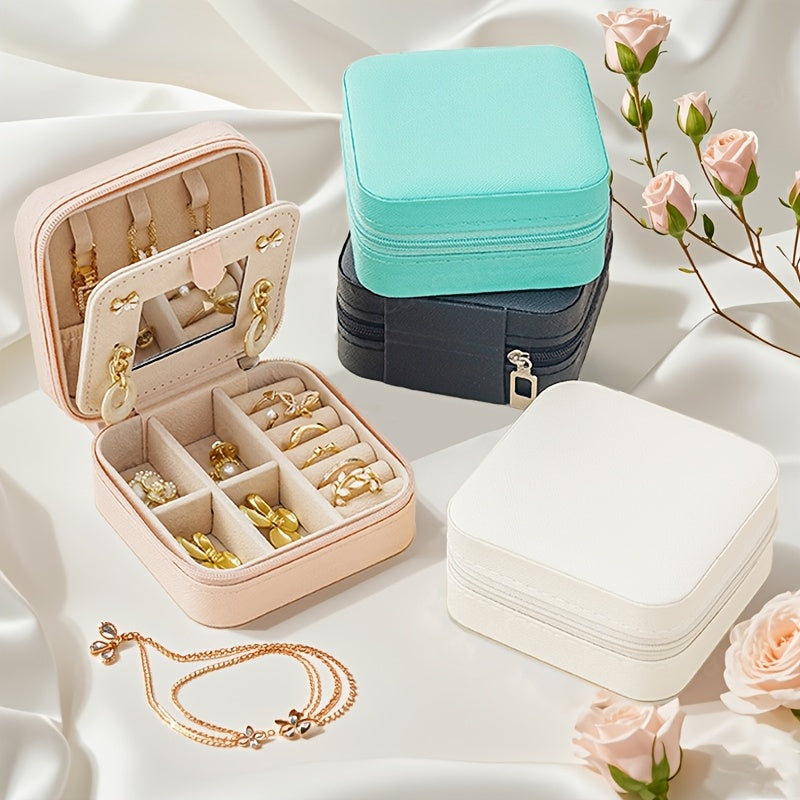 Small jewelry box with mirror, three-layer zipper storage for travel, multiple compartments for jewelry.