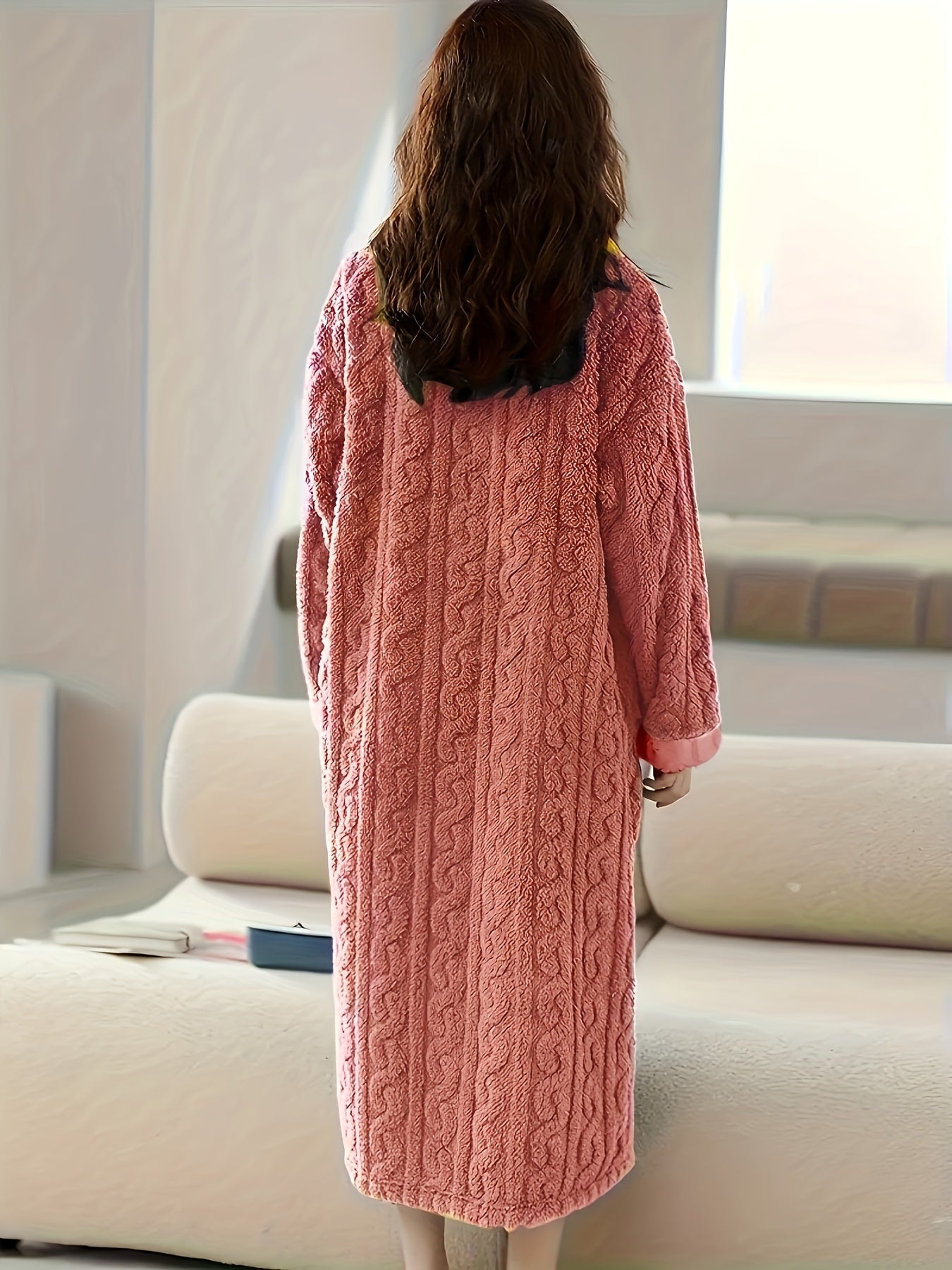 Cozy coral fleece nightdress with pockets, perfect for winter.