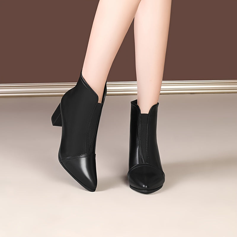 French black ankle boots with a mid-heel, pointed toe, and versatile style for women's winter.