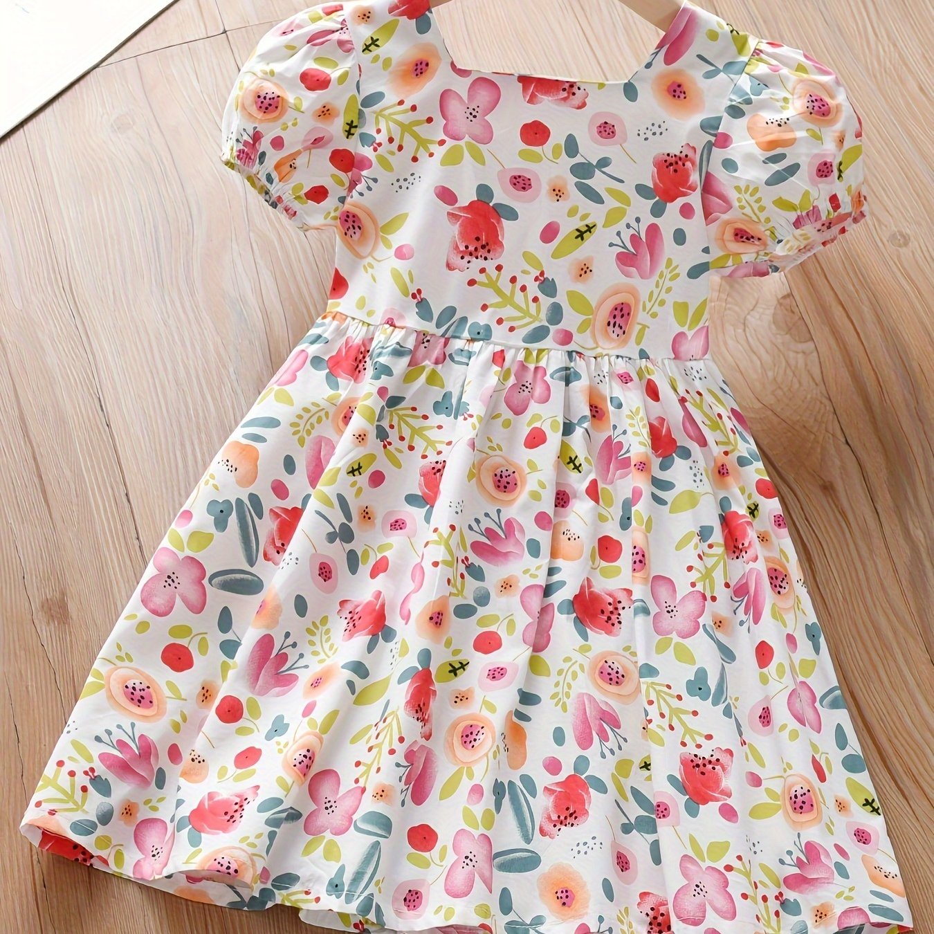 Summer dress with cute floral print and puff sleeves for girls