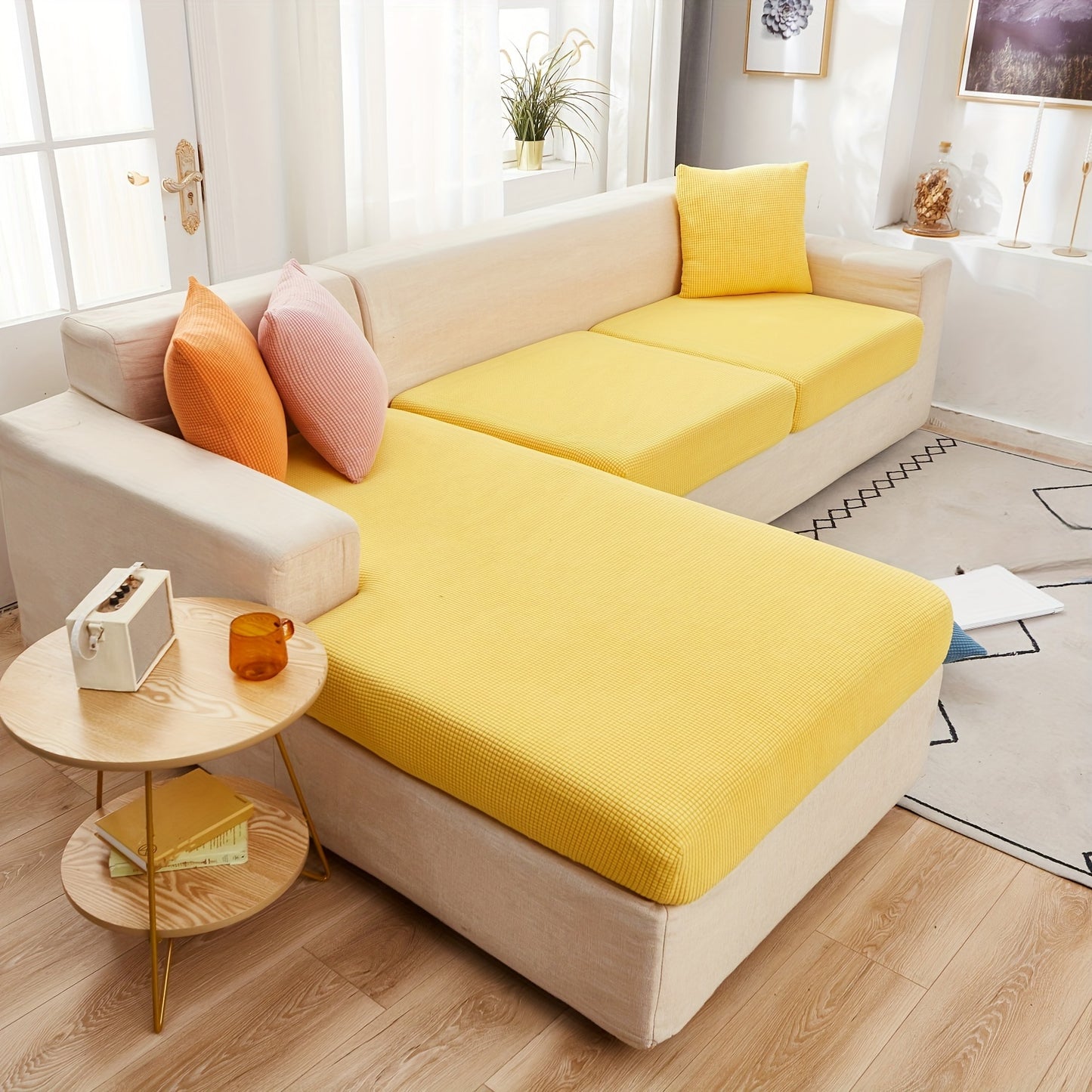 Durable sofa cover protects furniture from spills and stains.