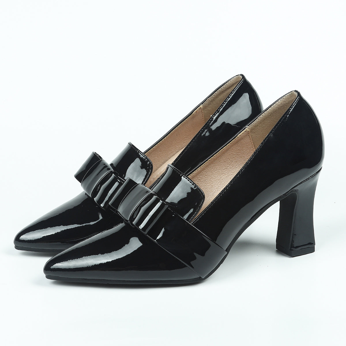 Women's elegant solid color pumps with bowknot design, block heel and waterproof features.