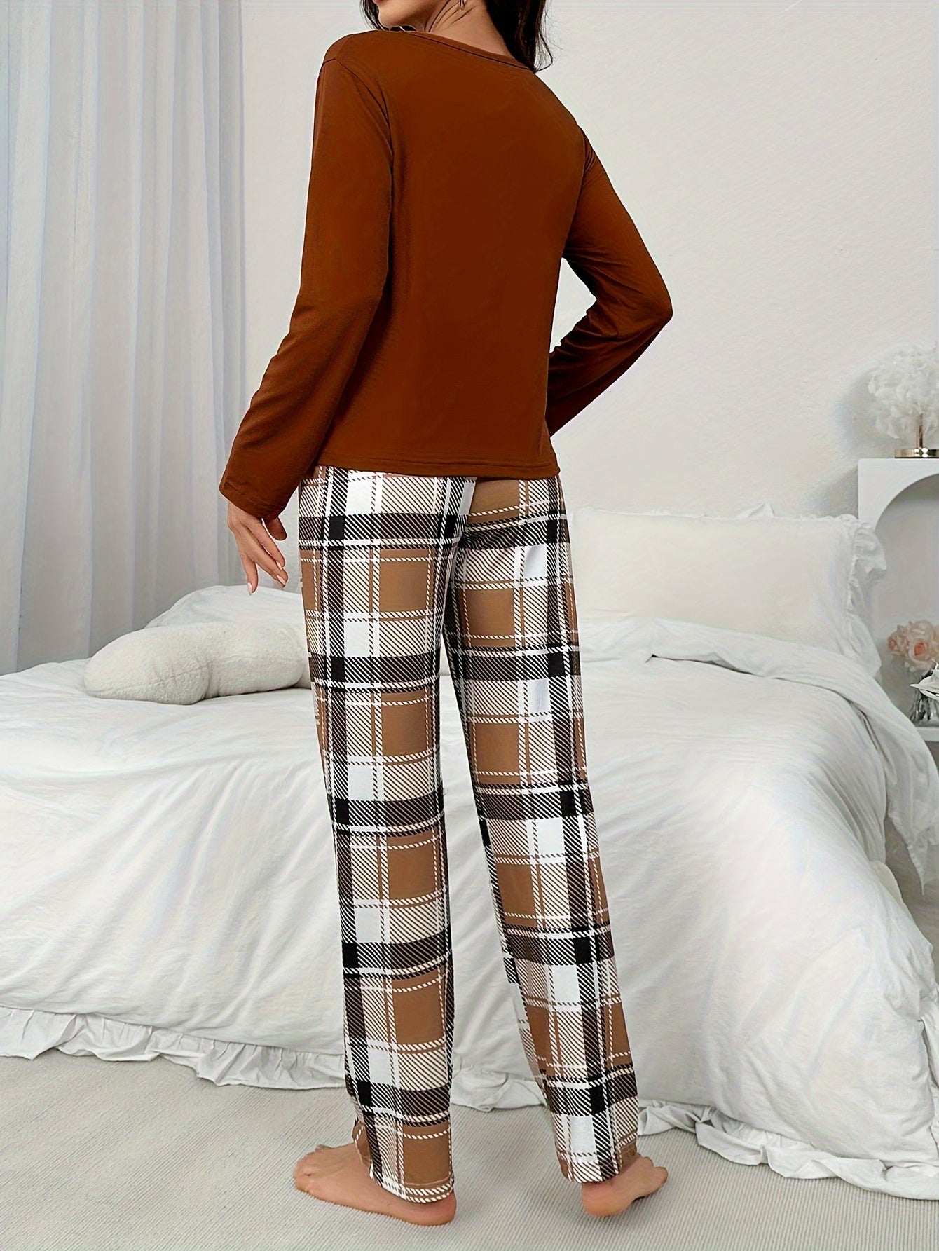 Cozy plaid pajama set for women, perfect for autumn.