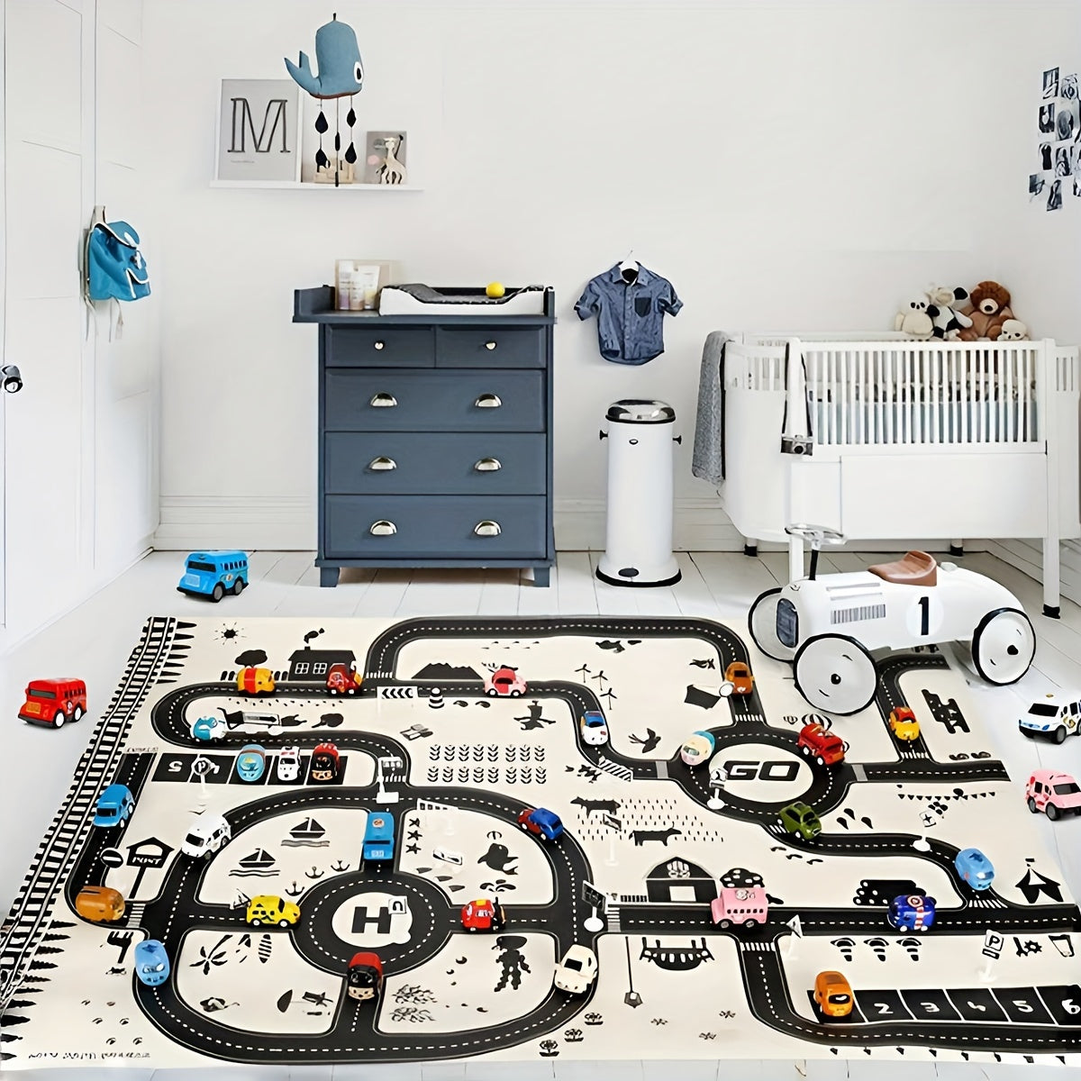 Nordic-inspired black and white parking lot play mat for children with waterproof surface, featuring a city theme traffic map gamepad