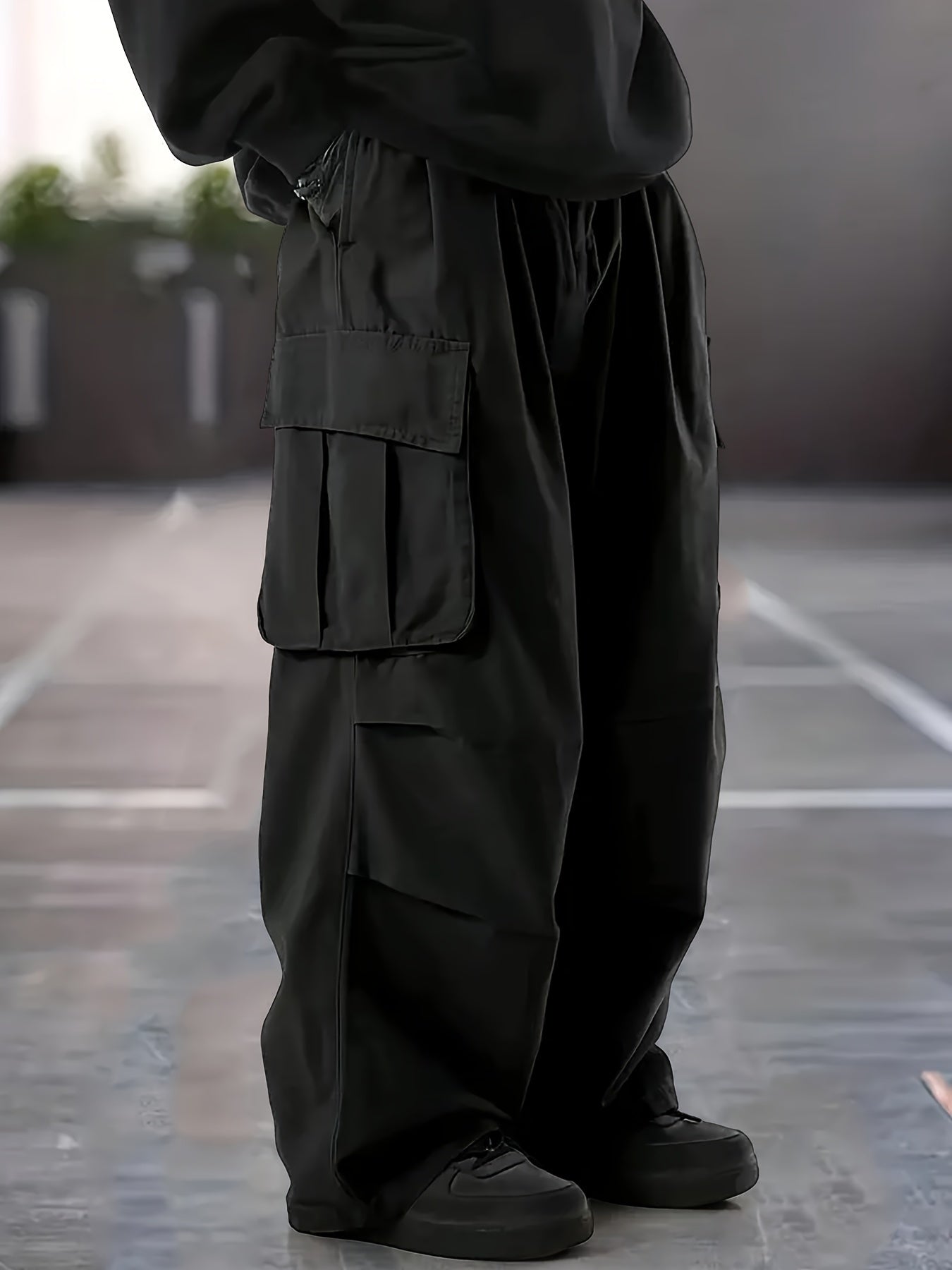 Men's plus size cargo pants made of 100% polyester with multi-pocket design, straight leg fit, and waterproof fabric. Perfect for outdoor activities and travel, available in big and tall