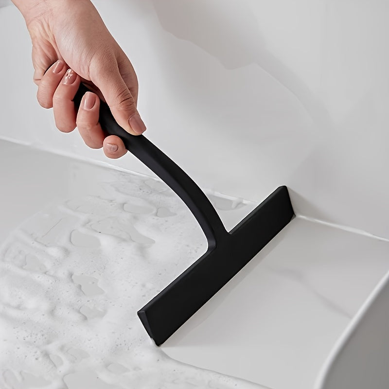 Introducing a versatile Silicone Squeegee designed for shower, glass, and bathroom cleaning. This product boasts an ergonomic handle and convenient storage rack, making it perfect for cleaning living rooms, bedrooms, toilets, and floors.