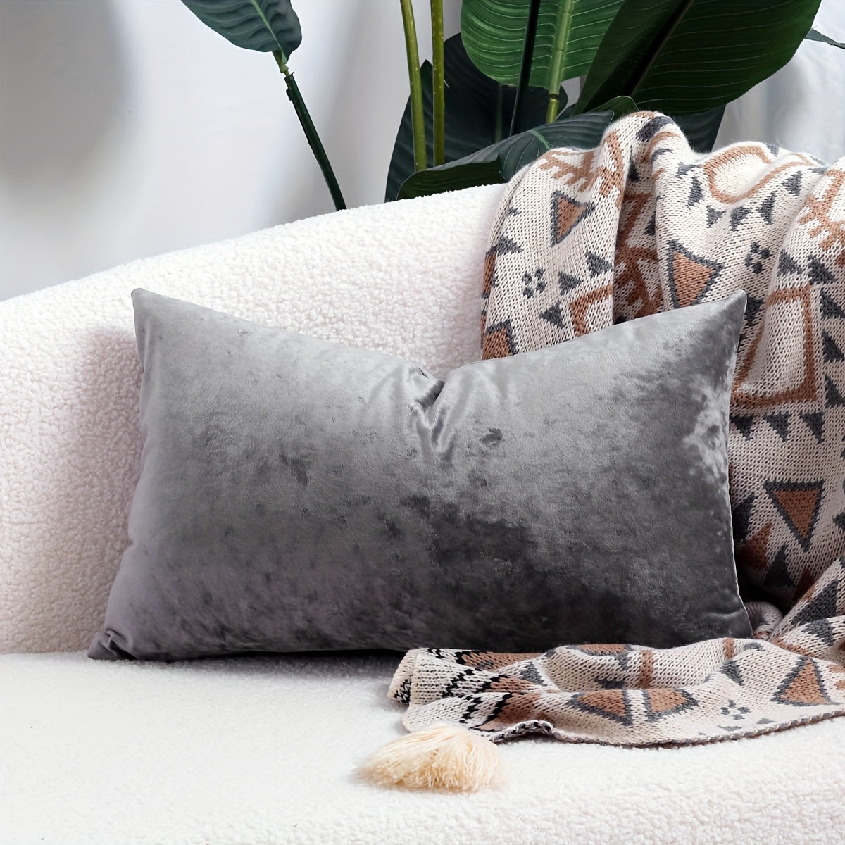 Luxurious velvet throw pillow cover with speckled texture, perfect for sofa and bed. Contemporary style with zip closure, machine washable. Made of 100% polyester.