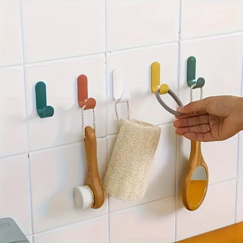 6 strong adhesive J-shaped hooks for kitchen storage, with no-drill, rust-resistant plastic design.