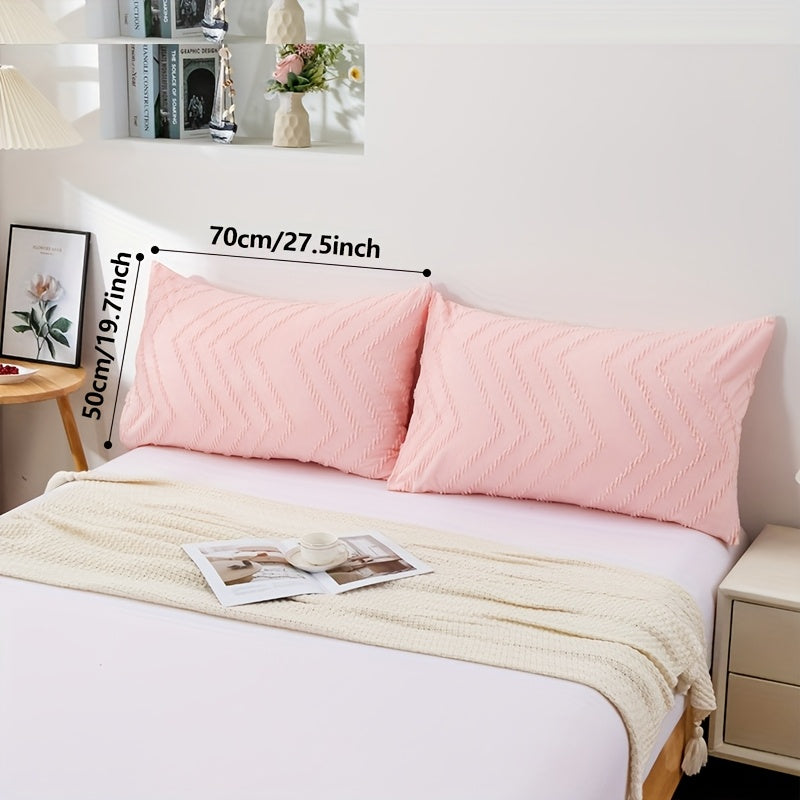 Choose from three different styles and multiple colors with this set of two pillowcases. Made of skin-friendly 100% polyester fiber spandex fabric, these pillowcases are soft and comfortable. They come in a 50x70 size and feature a bubble yarn skirt