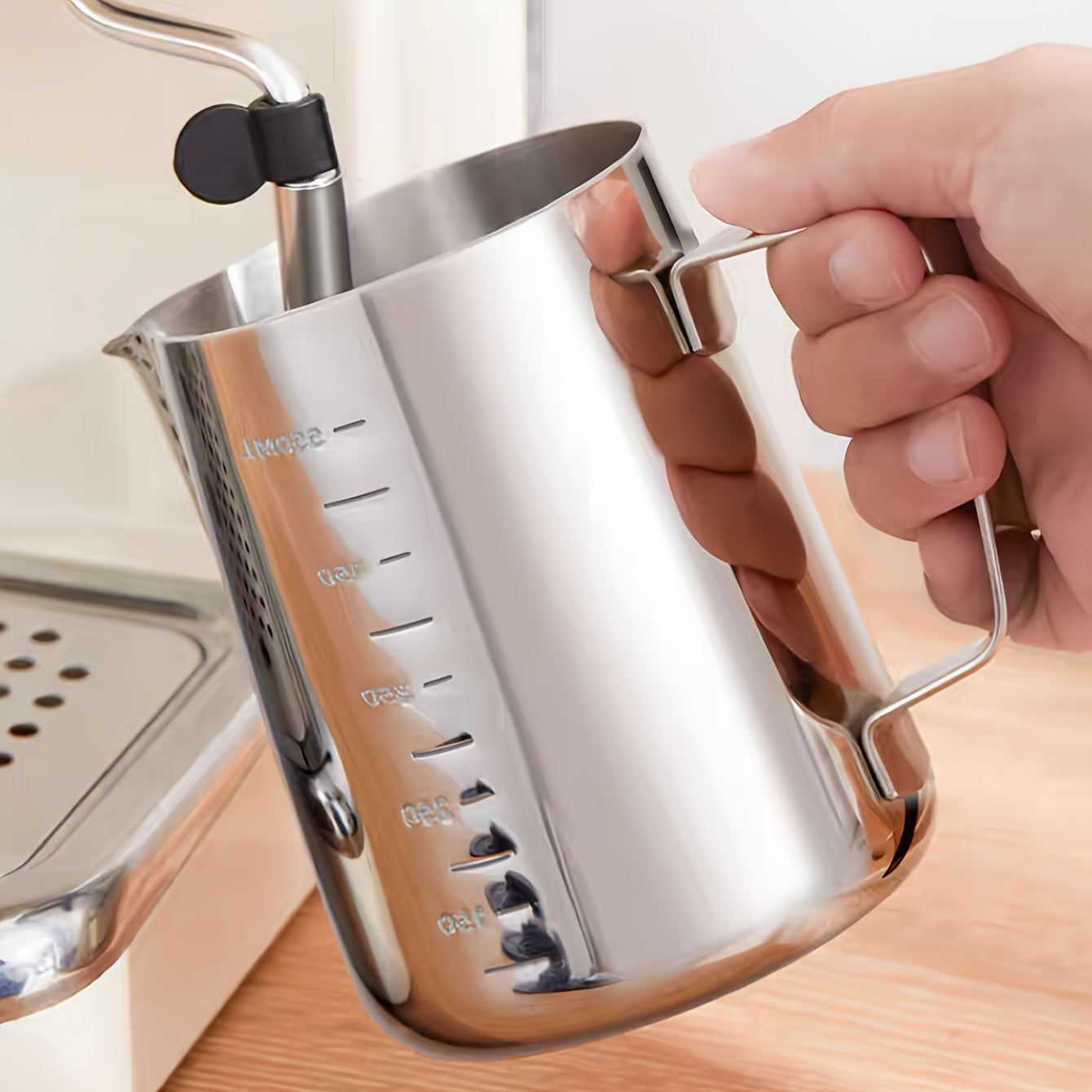 The Stainless Steel Coffee Art Cup is perfect for creating beautiful latte art, cappuccinos, and iced teas. Featuring convenient measurement marks and a large capacity, this milk frothing pitcher is available in 350ml, 600ml, and 900ml sizes.