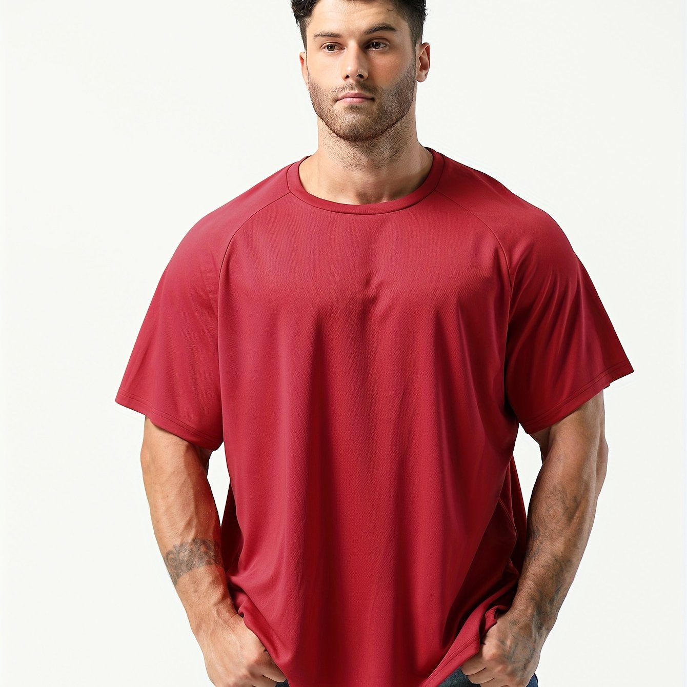 Plus-size men's moisture-wicking short-sleeve T-shirt for casual sports.