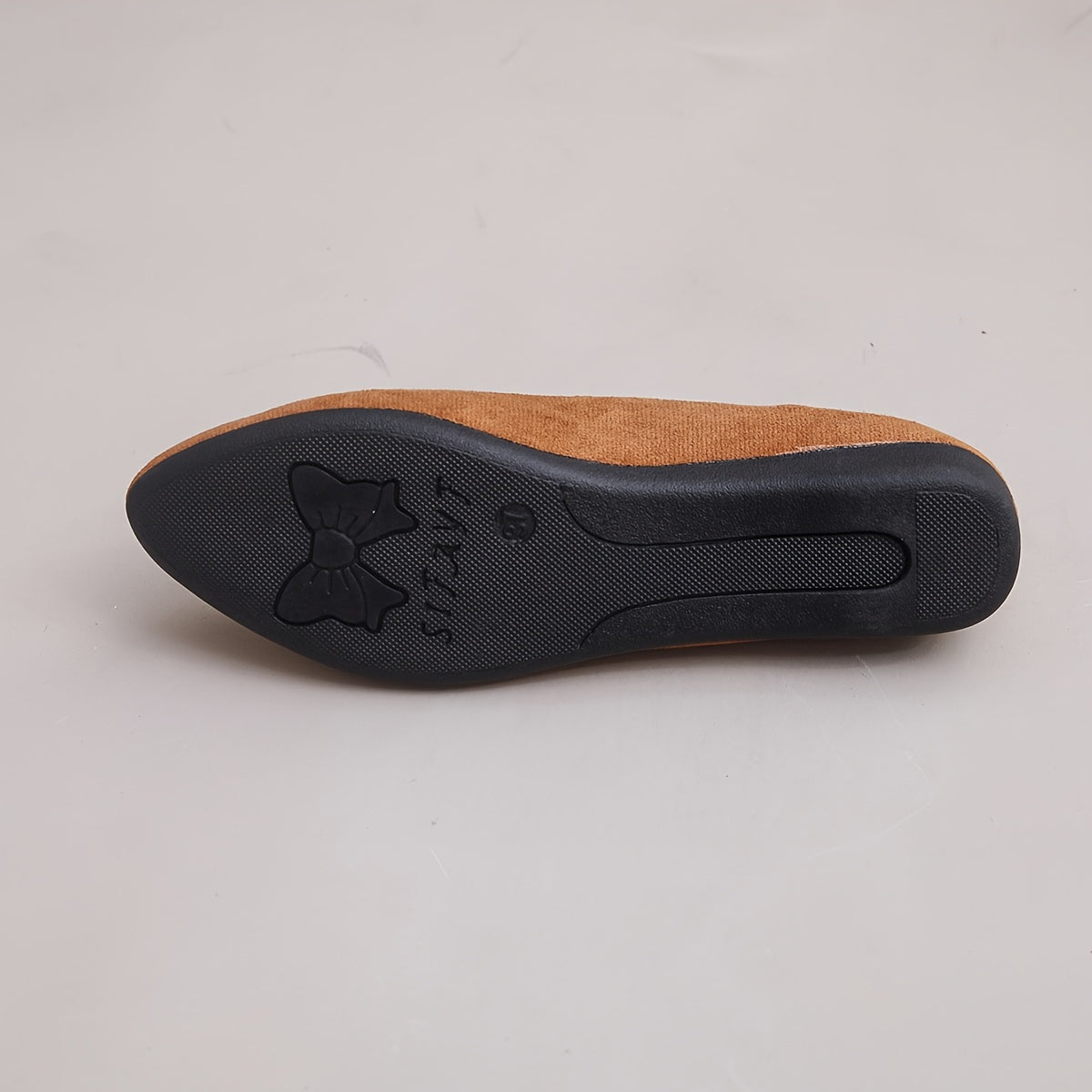 Women's solid color casual flats with a soft sole and point toe.