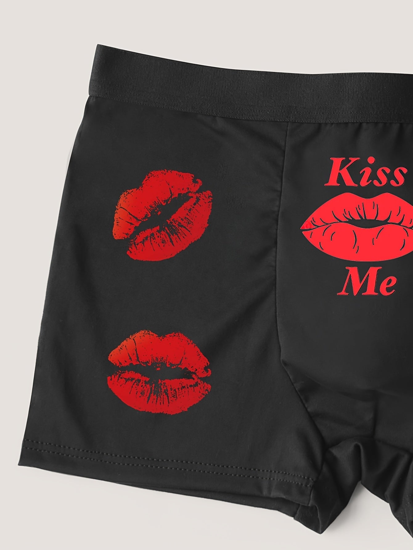 Men's black boxer shorts with red lips and print letter patterns for Valentine's Day, comfortable and stretchy.