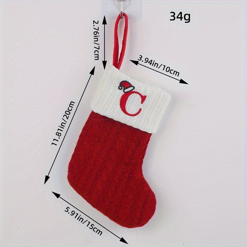 Knitted letter Christmas socks for home tree ornaments; red socks in gift bag for festive attire.