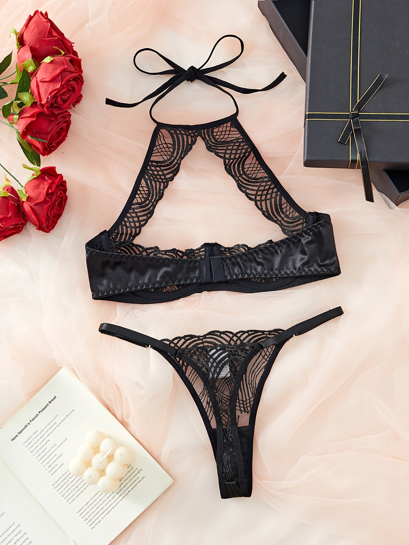 Mesh lingerie set with hollow out bra and thong, offering sexy intimates for women.