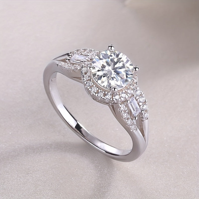 925 Sterling Silver Promise Ring featuring a 1ct Moissanite stone with an 18k Gold Plated Classy Halo Design. This High Quality Engagement or Wedding Ring comes with a Certificate of Authenticity and a Gift Box included.