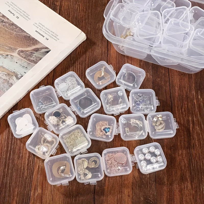 20-pack of rectangle storage boxes with lockable lids for jewelry, accessories, and more. Durable plastic cases with buckle closures and transparent display.