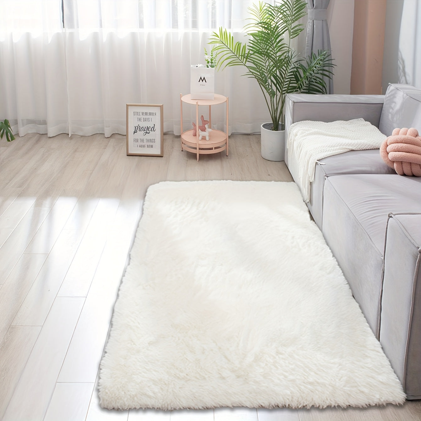 Soft and fluffy rectangle area rug perfect for your bedroom. This plush carpet is thick and non-slip, making it ideal for your living room. Made with machine-made polyester fiber, this low-pile rug is washable for easy cleaning. Perfect for indoor use.