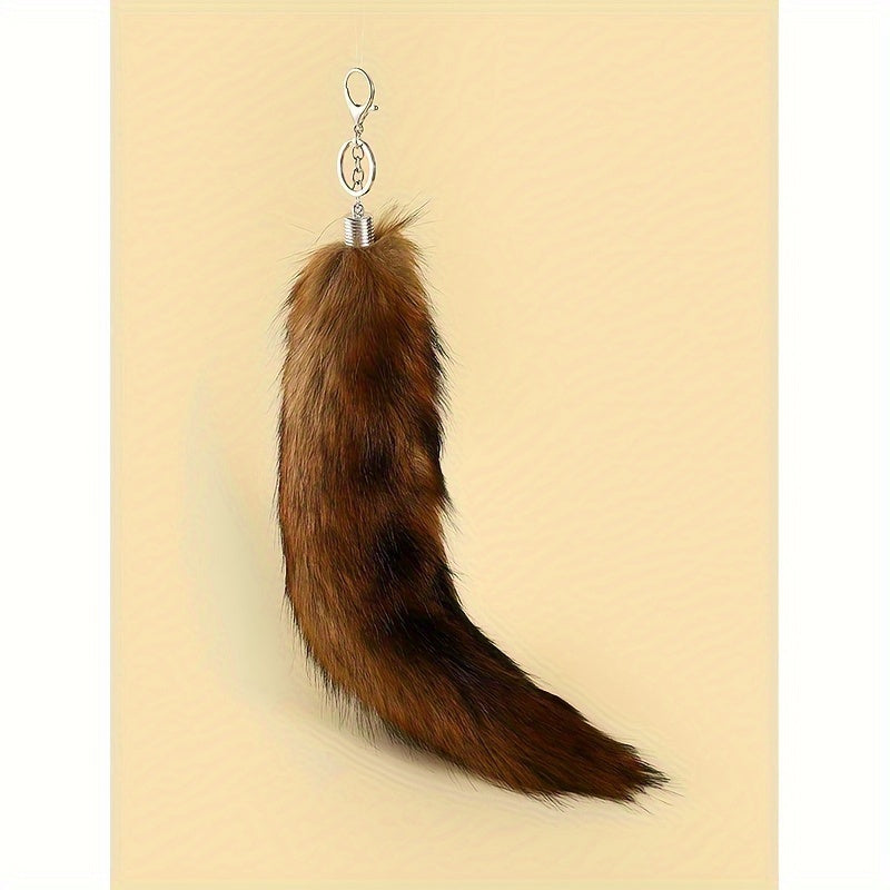 Large Faux Fox Tail Keychain for Women, made with Flannelette Fur and designed as a Carry Bag Keyring. This Novelty Fashion Accessory features a Lobster Claw Closure and is a Decorative Keyring perfect for Birthday Gifts.