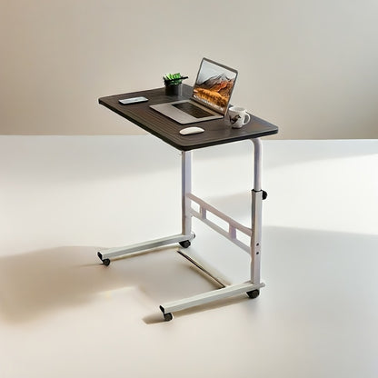 Rolling desk with adjustable height, space-saving metal frame. Ideal for home office and bedroom use. Available in ginger, white, black.