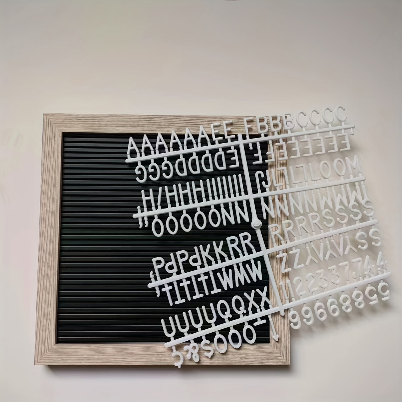 25.4x25.4 cm Blister Message Board with 147 replaceable letters, numbers, and symbols.