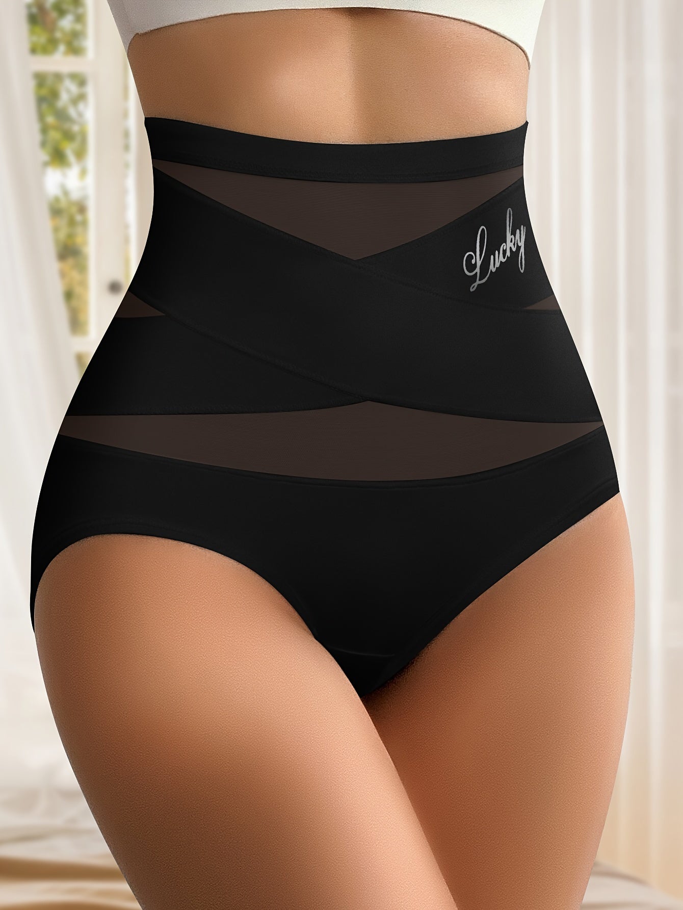 MIOTAN 7-Pack High-Waisted Tummy Control Briefs with Mesh, Compression, Seamless shaping and lift in Black. Made of 90% Polyester and 10% Elastane with 200gsm lining weight.